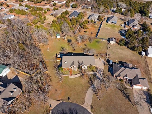 birds eye view of property with a residential view