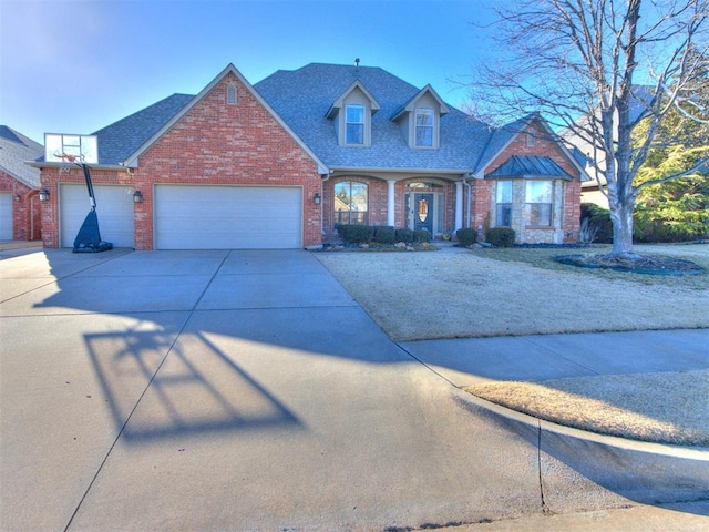 view of front facade featuring a garage, roof with shingles, concrete driveway, and brick siding