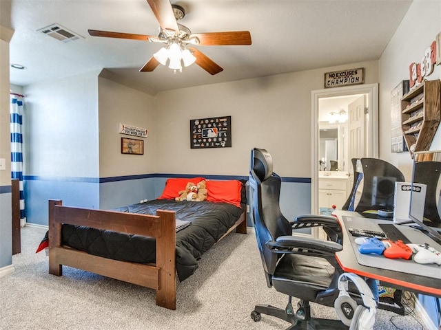 bedroom featuring light carpet, ceiling fan, visible vents, and baseboards