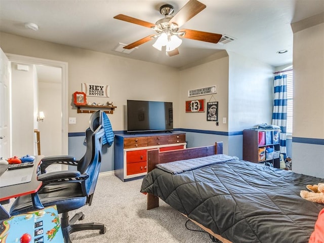 bedroom with carpet flooring, visible vents, and a ceiling fan