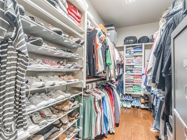 spacious closet with wood finished floors