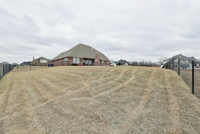 view of yard with fence