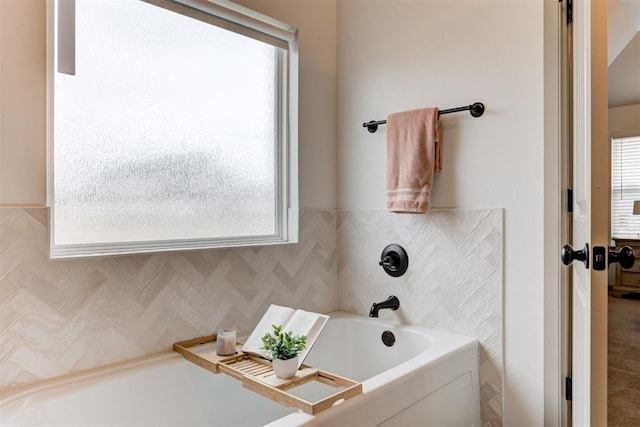 full bath with a garden tub