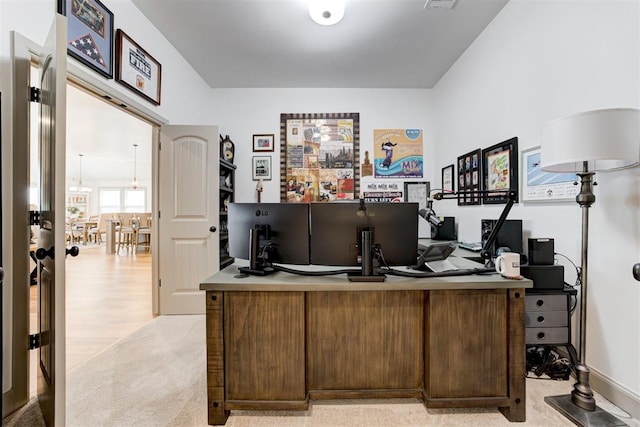 home office featuring light carpet and visible vents