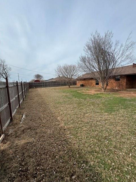 view of yard featuring fence