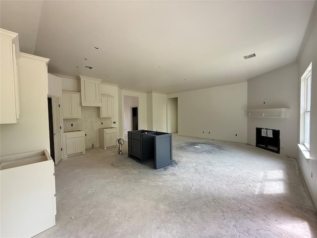 3438 NW 178th Ter, Edmond, OK 73012 - unfurnished living room with a fireplace and ornamental molding