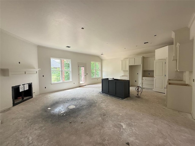 3438 NW 178th Ter, Edmond, OK 73012 - unfurnished living room with a fireplace and crown molding