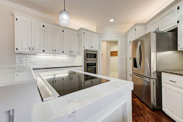 kitchen with decorative backsplash, dark wood-style floors, ornamental molding, decorative light fixtures, and stainless steel appliances