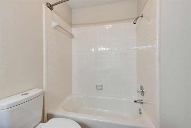 full bath featuring tub / shower combination and toilet