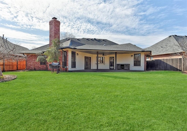 3705 Barwick Dr, Norman, OK 73072 - back of house with a chimney, a patio, a ceiling fan, roof with shingles, and brick siding