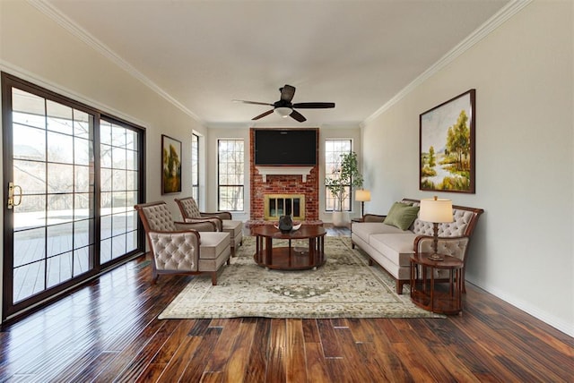 3705 Barwick Dr, Norman, OK 73072 - living room with crown molding, hardwood / wood-style floors, a ceiling fan, and a fireplace