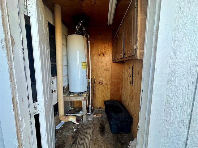 utility room with water heater