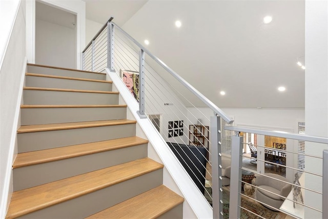 stairs with recessed lighting