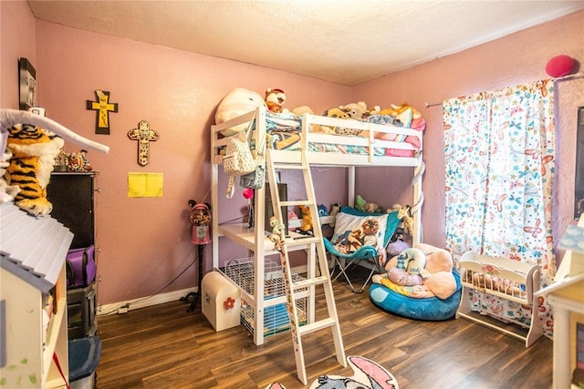 bedroom featuring dark wood-type flooring