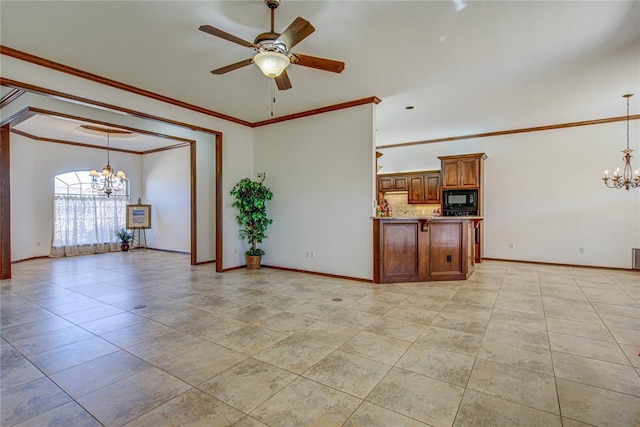 unfurnished living room with ceiling fan with notable chandelier, ornamental molding, light tile patterned floors, and baseboards