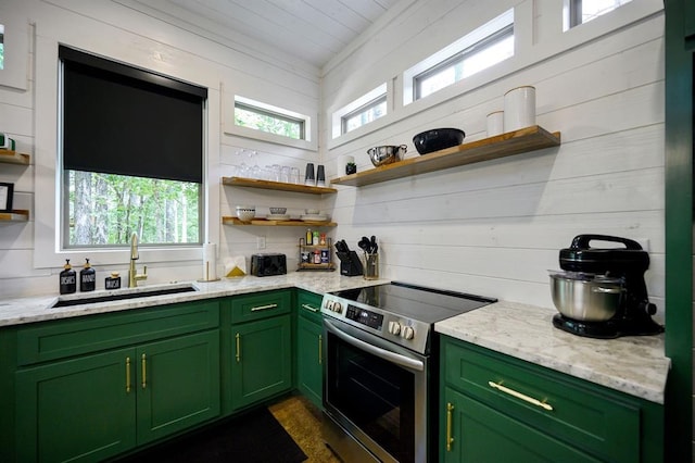 160 Bombardier Ln, Broken Bow, OK 74728 - kitchen with open shelves, green cabinetry, stainless steel electric range oven, and a sink