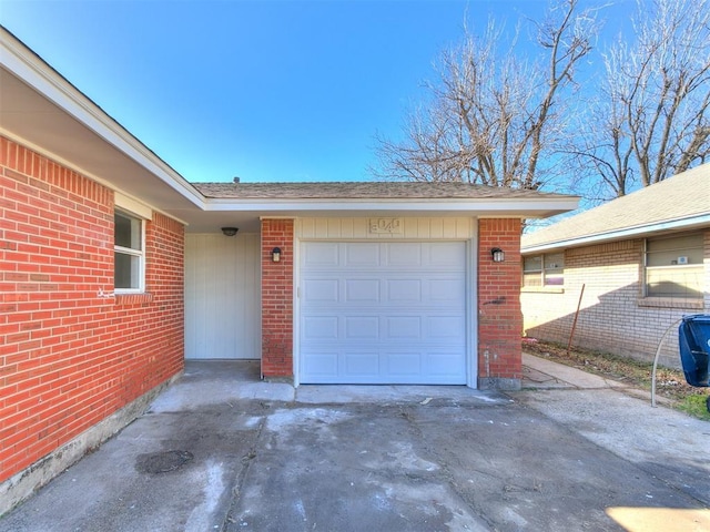 garage featuring driveway