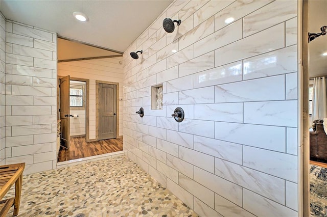 full bathroom with tiled shower