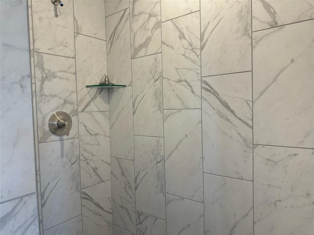 details featuring a tile shower