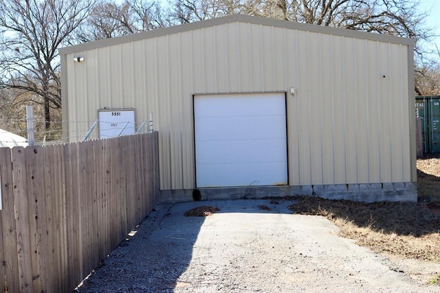 detached garage with fence