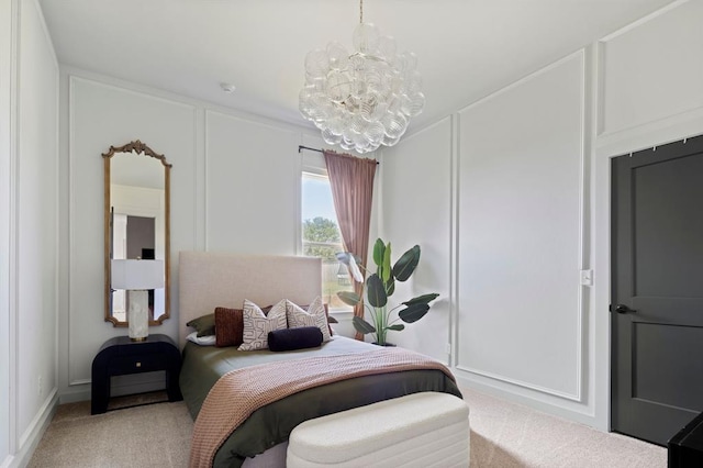 bedroom with carpet floors, a notable chandelier, and a decorative wall