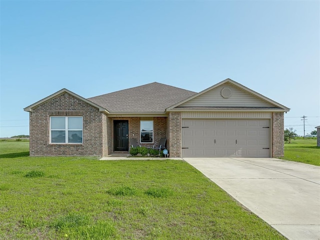 42056 Cadens Trl, Shawnee, OK 74804 - ranch-style home featuring brick siding, a garage, concrete driveway, and a front lawn
