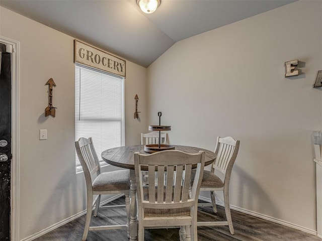 42056 Cadens Trl, Shawnee, OK 74804 - dining space with lofted ceiling and wood finished floors