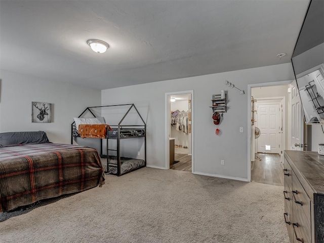 42056 Cadens Trl, Shawnee, OK 74804 - bedroom with carpet floors and connected bathroom