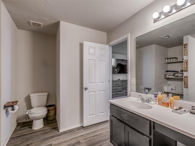 42056 Cadens Trl, Shawnee, OK 74804 - bathroom featuring wood finished floors and vanity