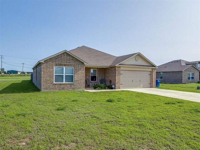 42056 Cadens Trl, Shawnee, OK 74804 - single story home with brick siding, a garage, a front lawn, concrete driveway, and roof with shingles