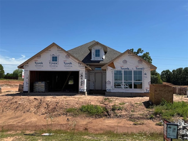 15422 NE 11th St, Choctaw, OK 73020 - unfinished property with a garage and a shingled roof