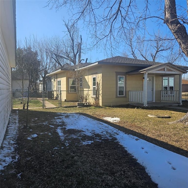 view of front of house with fence