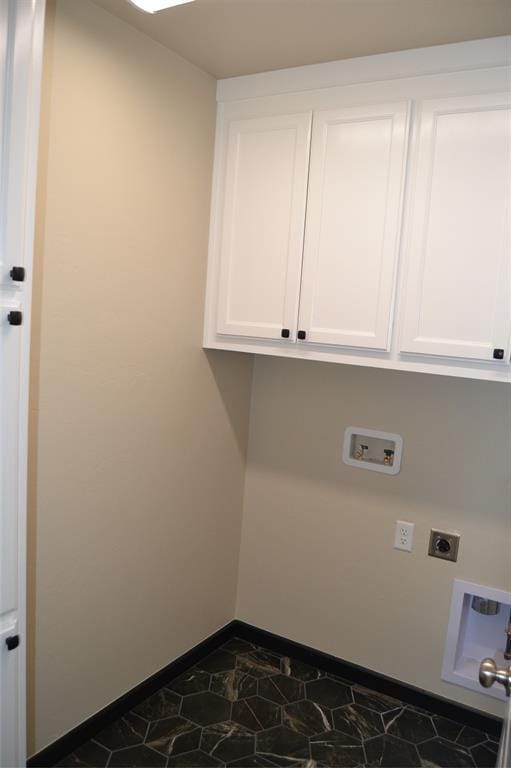 1525 NW 17th Pl, Newcastle, OK 73065 - laundry area featuring cabinet space, hookup for an electric dryer, baseboards, and washer hookup