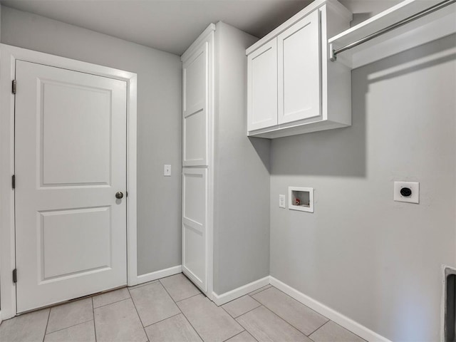 washroom featuring light tile patterned floors, baseboards, washer hookup, and hookup for an electric dryer