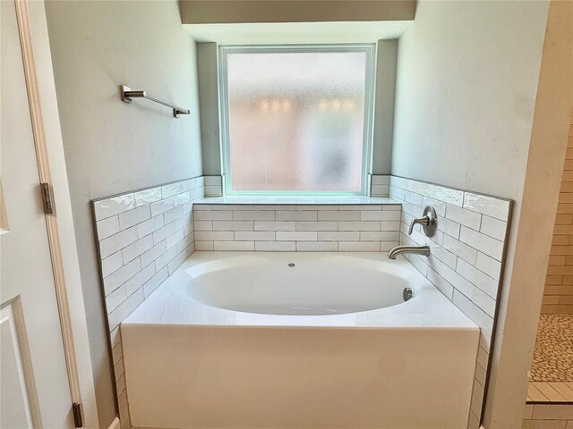 full bath featuring a garden tub