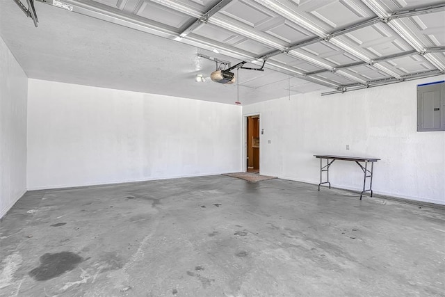 garage with electric panel and a garage door opener