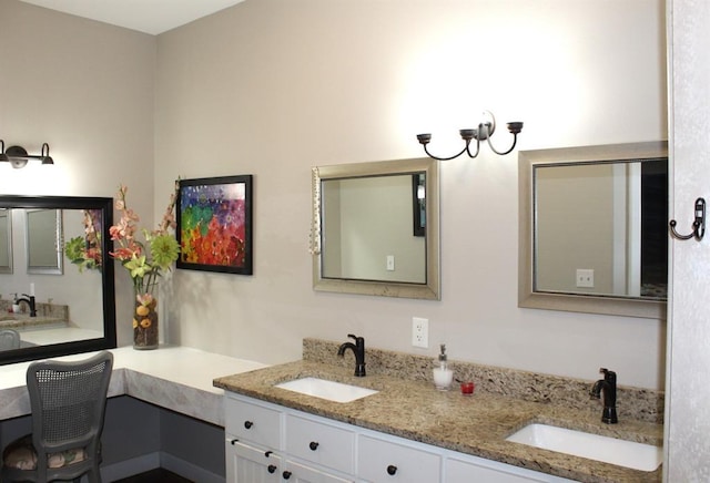 full bath with double vanity and a sink