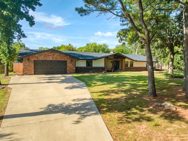 ranch-style house featuring an attached garage, brick siding, fence, concrete driveway, and a front yard