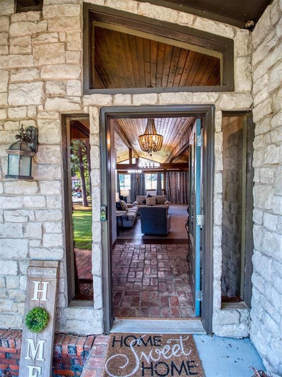 view of exterior entry with stone siding