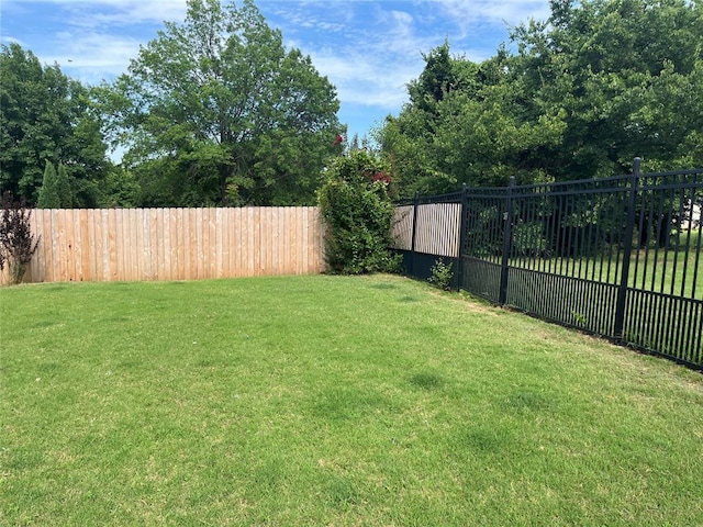 view of yard with fence