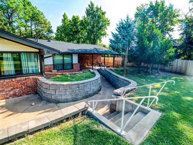 view of yard featuring a patio and a fenced backyard