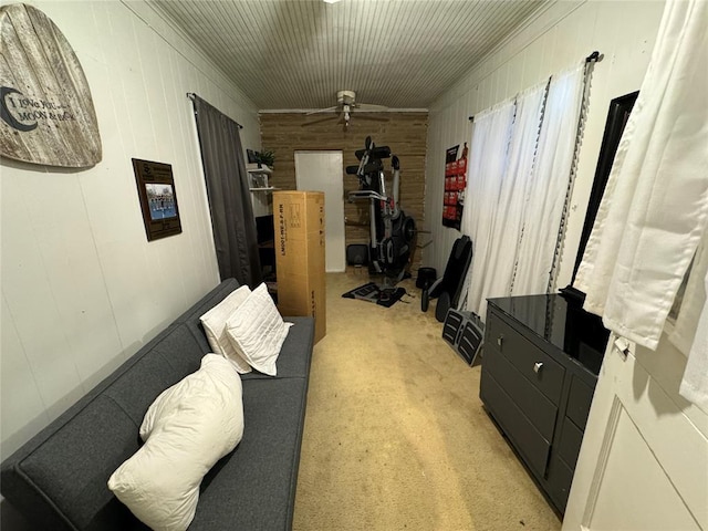 interior space with light carpet and crown molding