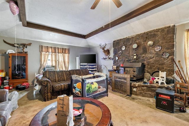 living room featuring light carpet, ceiling fan, and beamed ceiling