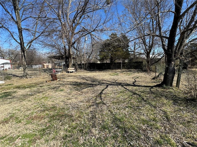 view of yard with fence