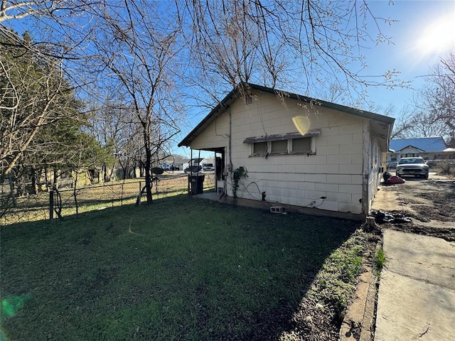 1416 Foster Ave, Seminole, OK 74868 - view of home's exterior with a yard and fence