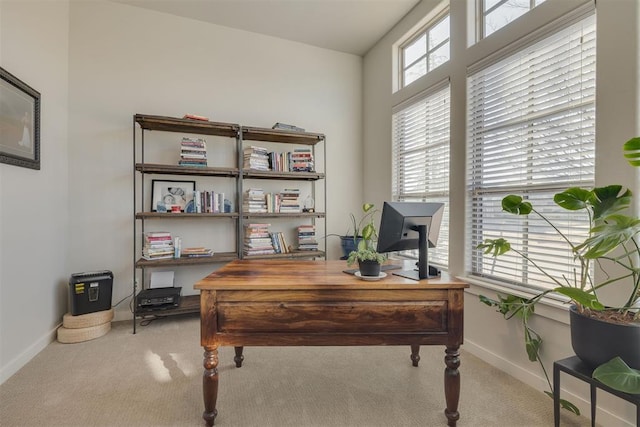 office area with baseboards and carpet