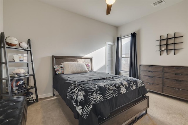 bedroom with visible vents, baseboards, ceiling fan, and carpet floors