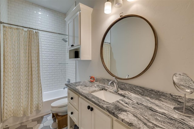 bathroom with shower / bath combination with curtain, vanity, and toilet