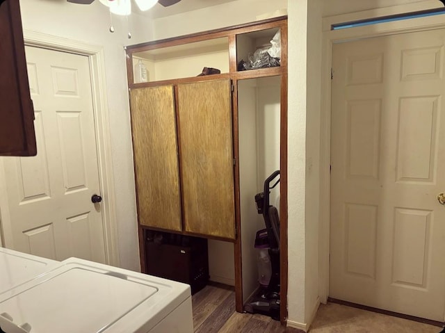 clothes washing area with cabinet space and ceiling fan