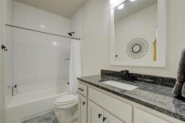 full bathroom featuring toilet, vanity, and shower / tub combo with curtain